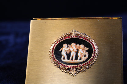 1940s Volupte Compact – Cherub Cameo with Ruby Rhinestones, Gold-Tone Vanity Compact