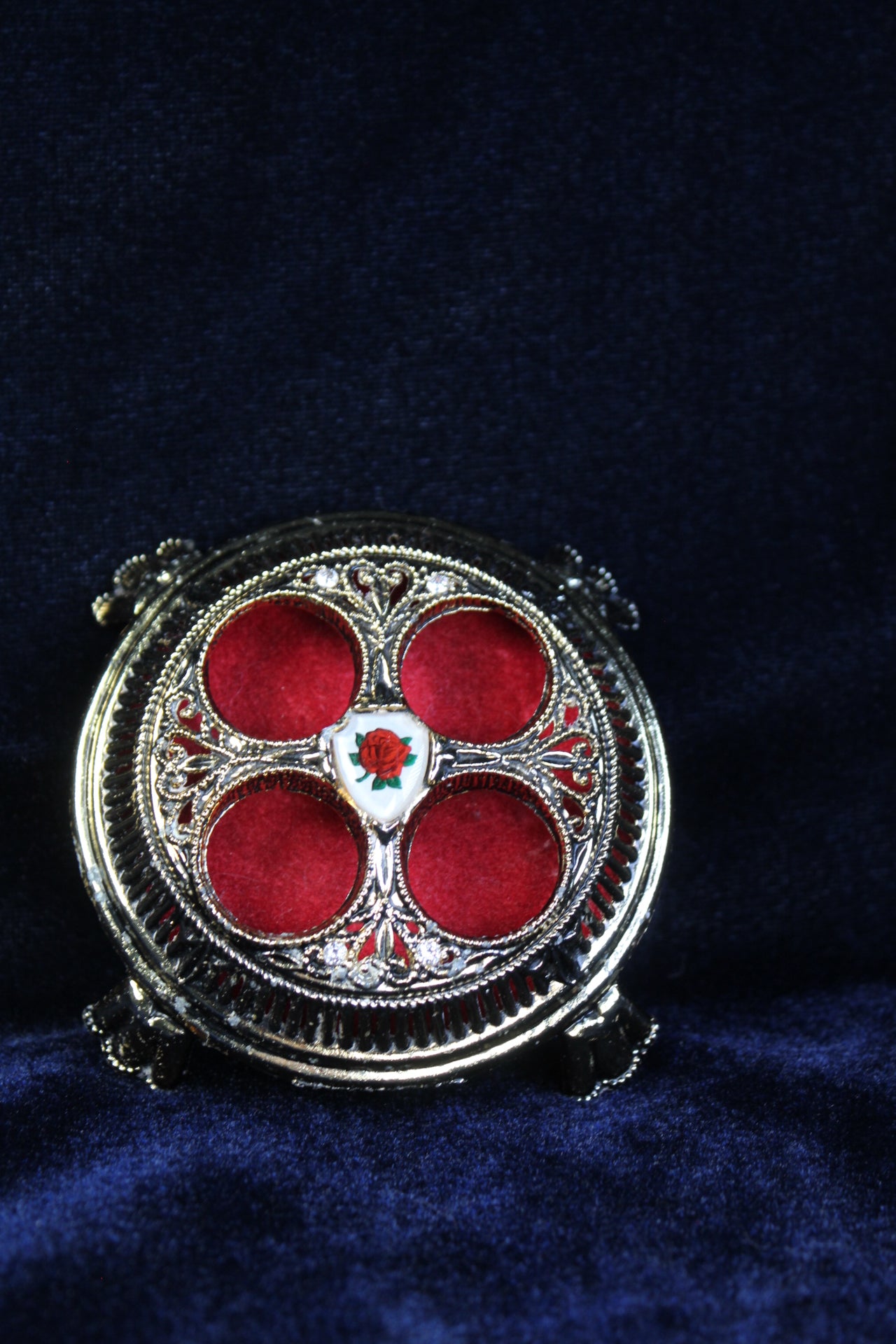 Thee Enchanted Rose vintage Hollywood lipstick holder with red velvet interior ￼