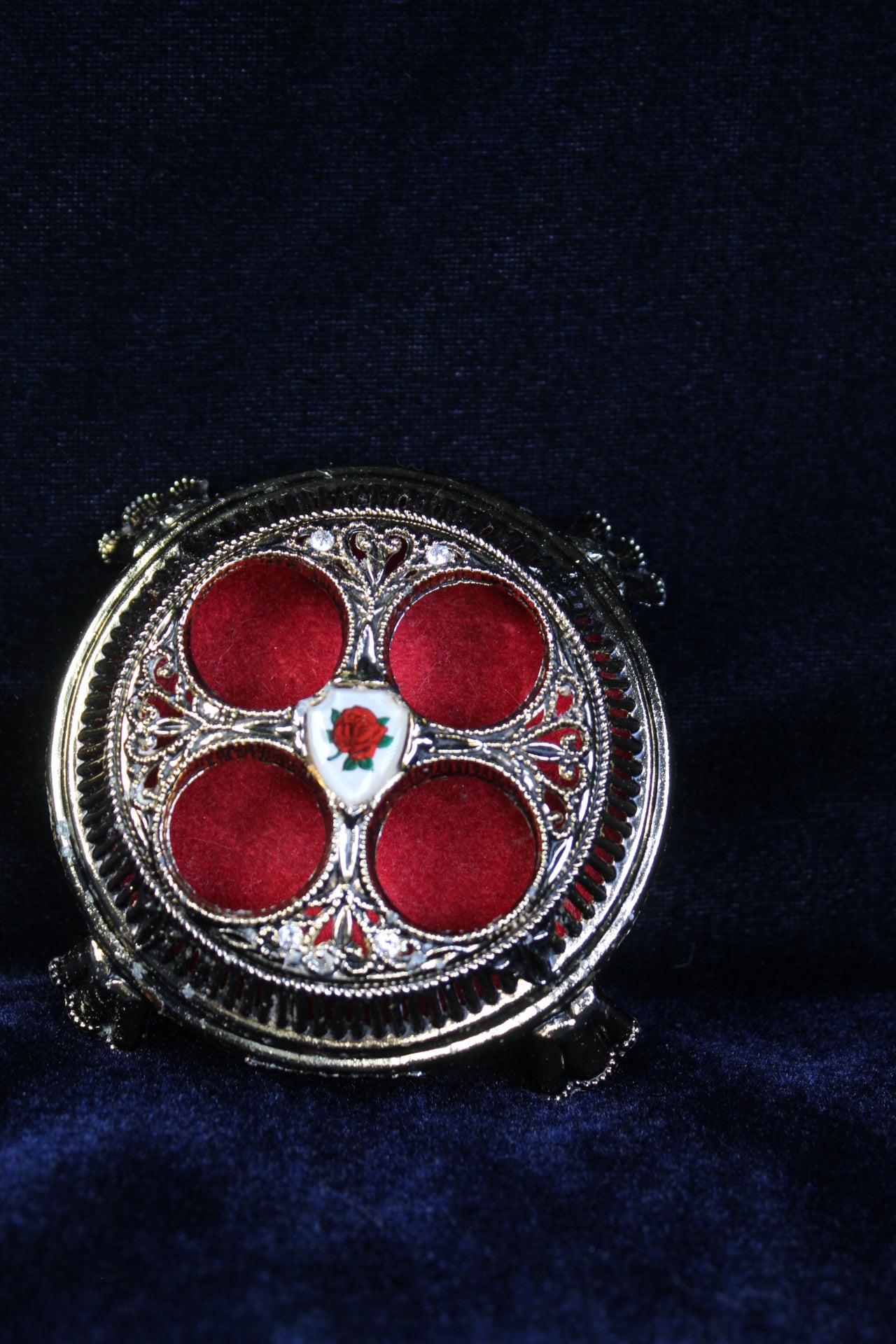 Thee Enchanted Rose vintage Hollywood lipstick holder with red velvet interior ￼
