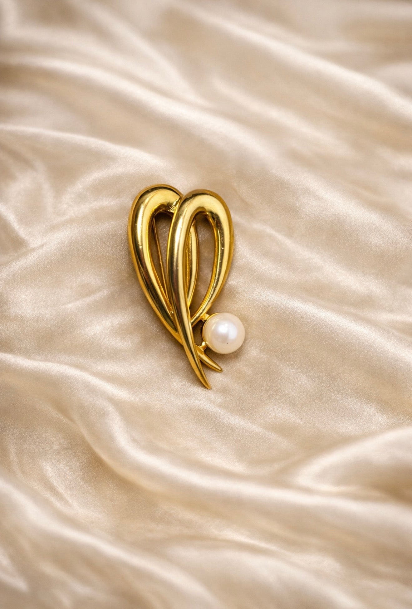 1950’s Signed gold tone wings brooch