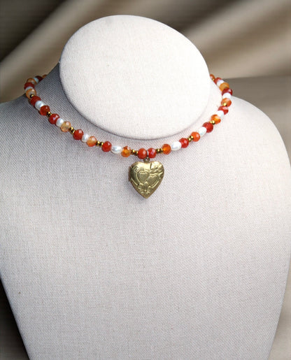Burning Devotion
Carnelian Heart locket Pearl Choker