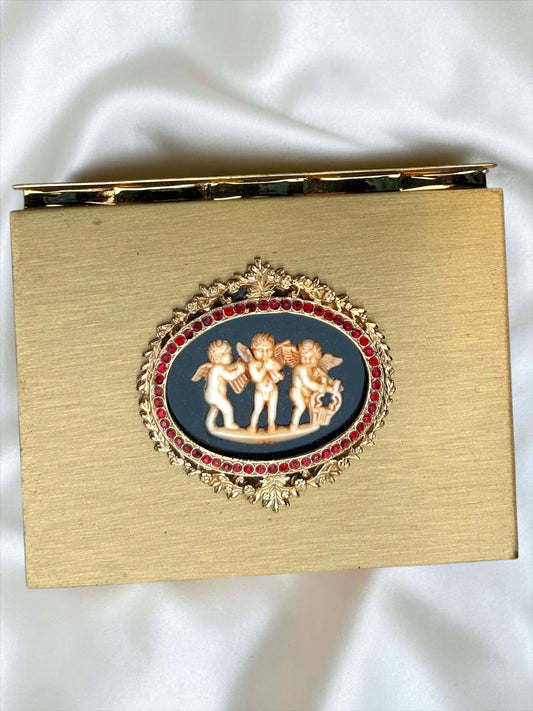 1940s Volupte Compact – Cherub Cameo with Ruby Rhinestones, Gold-Tone Vanity Compact