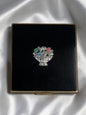 Vintage 1940s Black Enamel Compact with Floral Basket Motif – Original Rouge & Lip Product